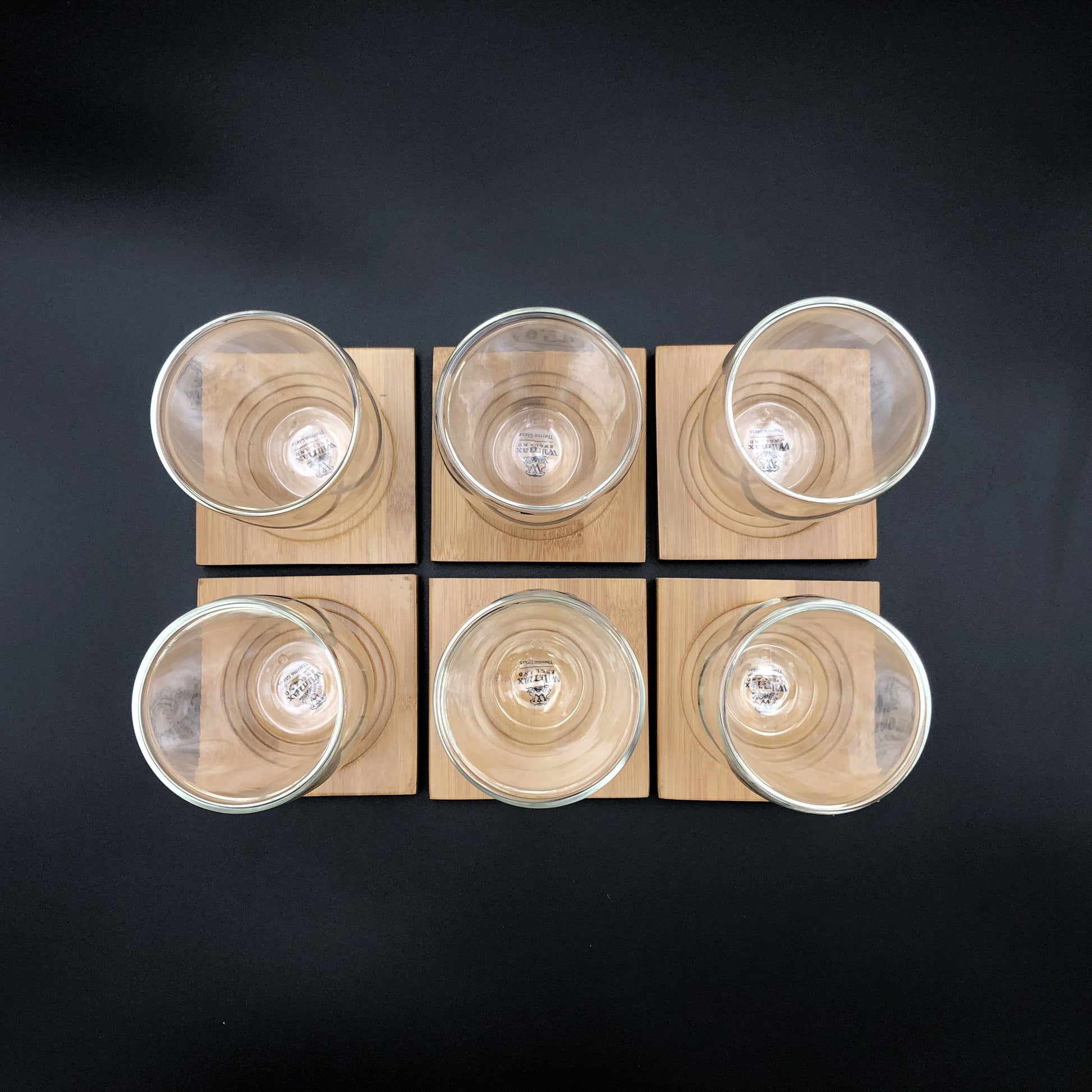 A Set Of 6 Bamboo Coaters/ Trays With 6 Doublewalled Thermo Glasses To Match-6